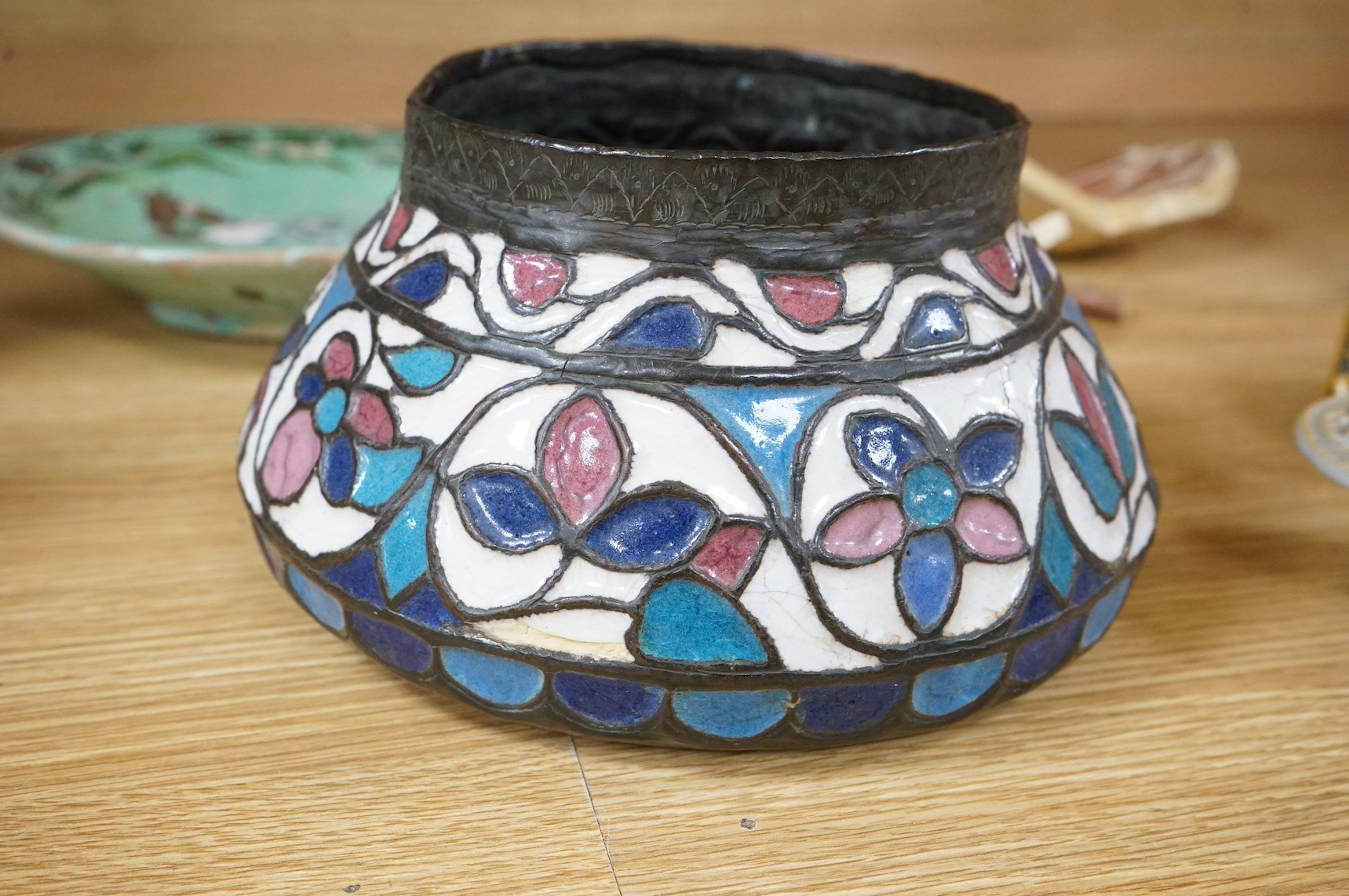 A 16th / 17th century Hispano Moresque copper lustre dish, together with other ceramics, largest 26cm in diameter. Condition - varies